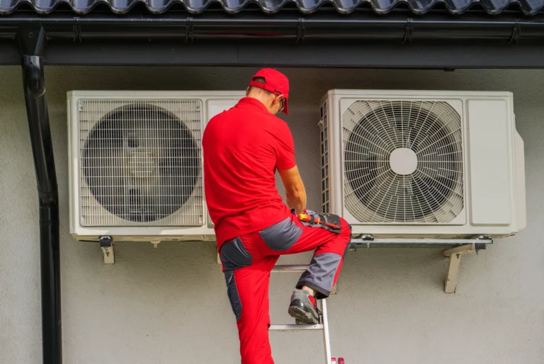 Heat Pump Repair Surrey technician inspecting a heat pump