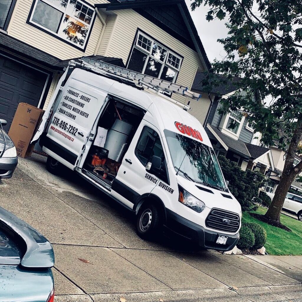 Guru Service Group Surrey service vans for plumbing, HVAC, and drainage solutions