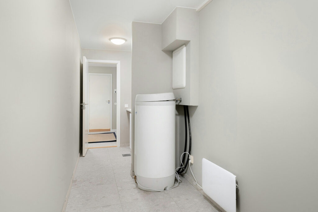 New hot water tank installation completed at Surrey home by Guru Service Group technician