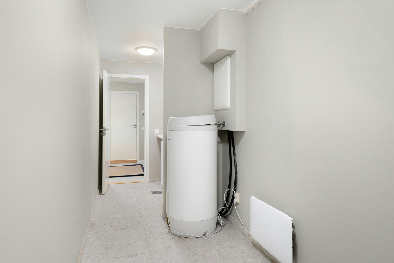 New hot water tank installation completed at Surrey home by Guru Service Group technician
