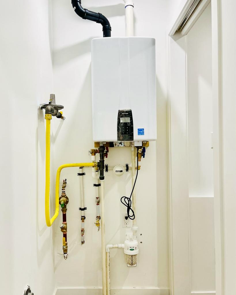 Tankless water heater installation by certified Guru Service Group technician